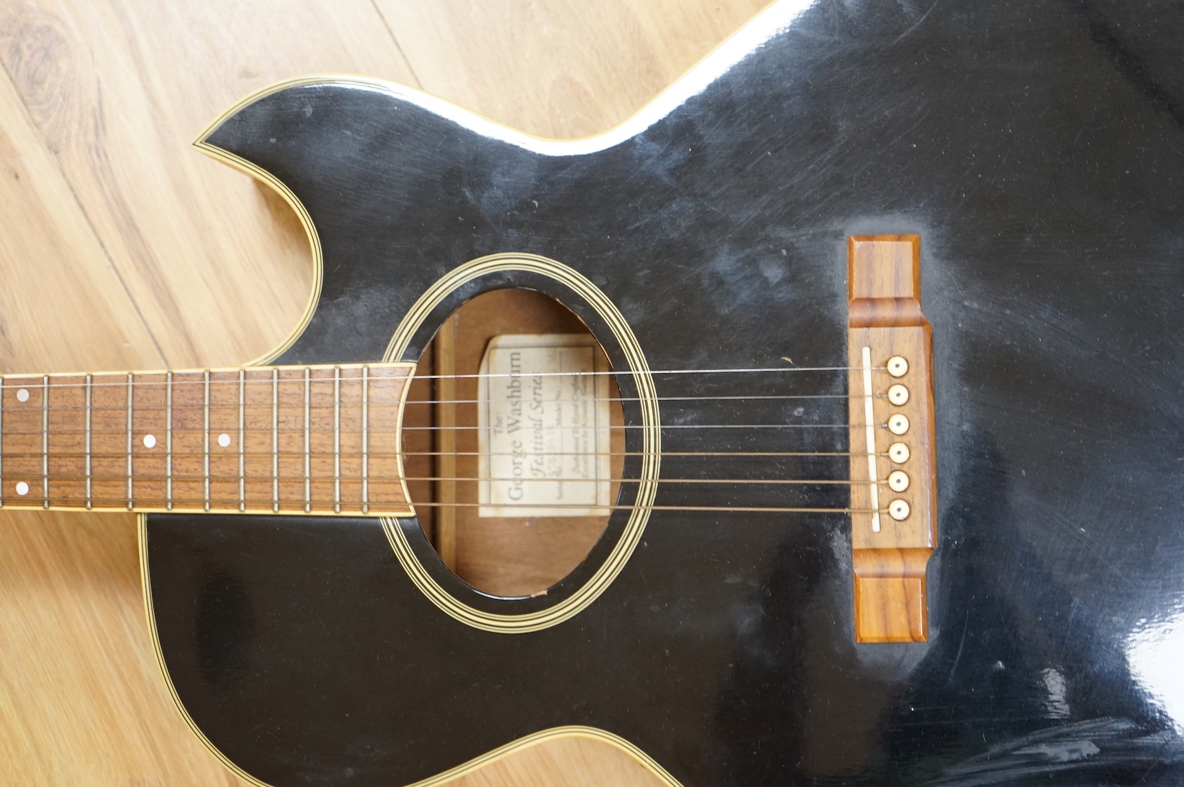 A Washburn festival series, 10mb electric-acoustic guitar